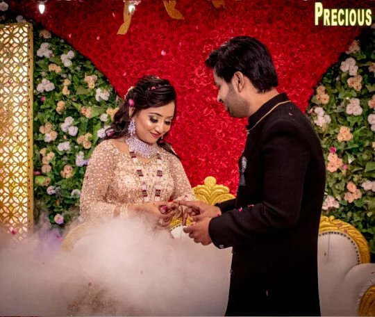 Engagement ceremony venue with floral decor at Precious Forever Banquet, Peeragarhi Delhi